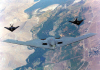 B-2 in Flight with Two F-117As (USAF Photo)