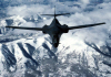 B-1 in Flight Over Mountains (USAF Photo)