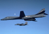 B-1 in Flight with F-15 Eagle (USAF Photo)